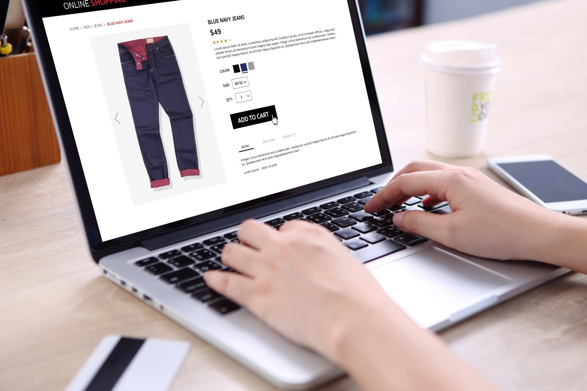 Consumer shopping for jeans on online shop